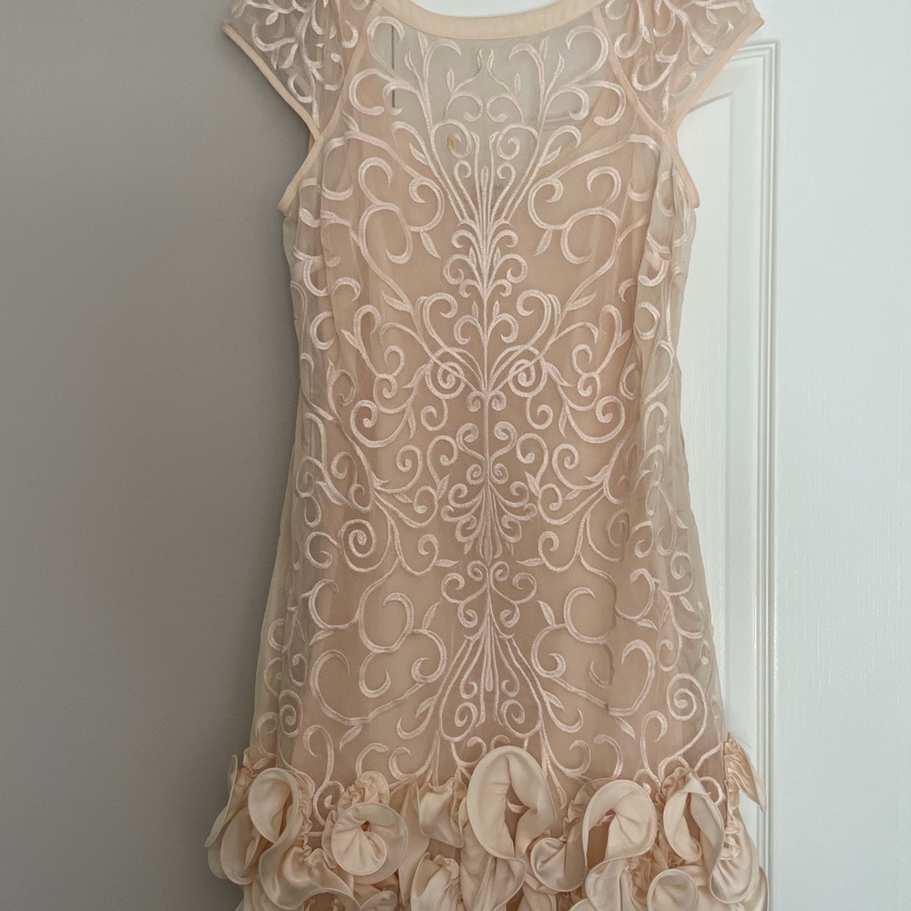 Elegant Beige Lace Dress with Floral Hem